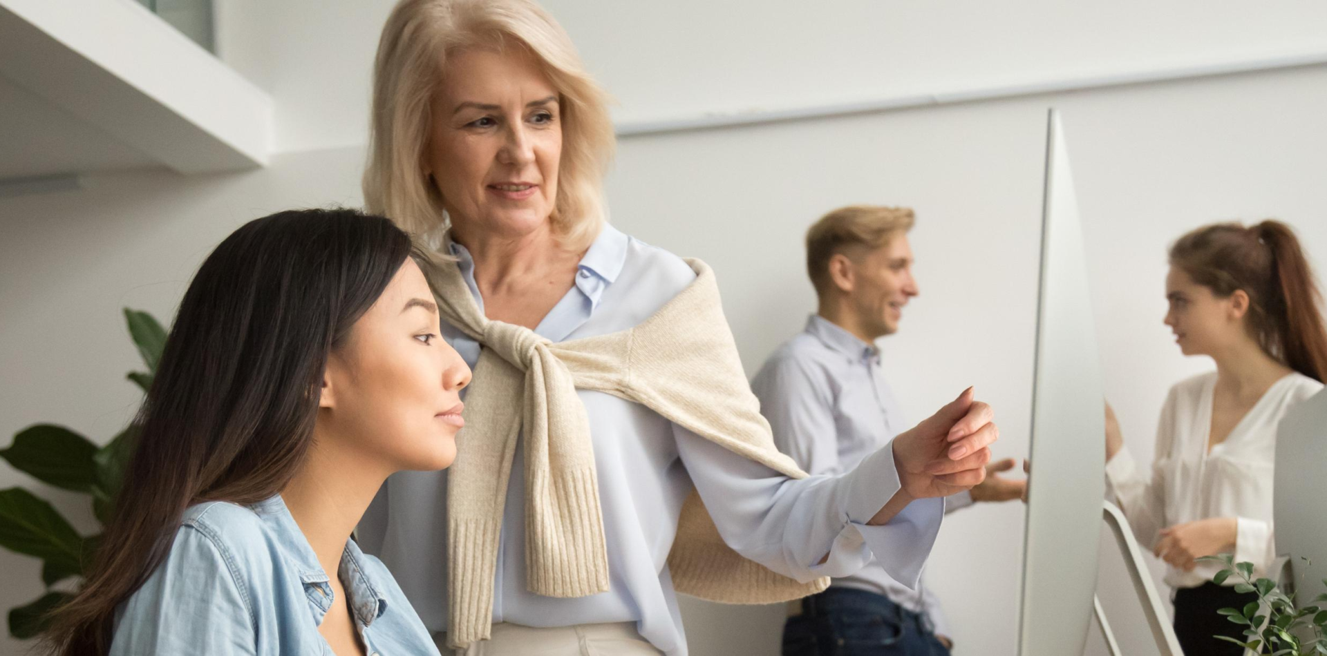 GenXand Baby Boomers working together